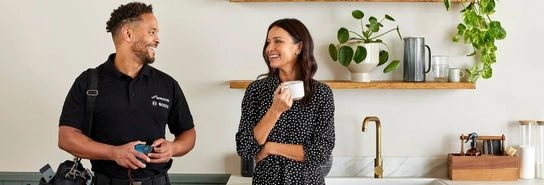 Installer talking with customer